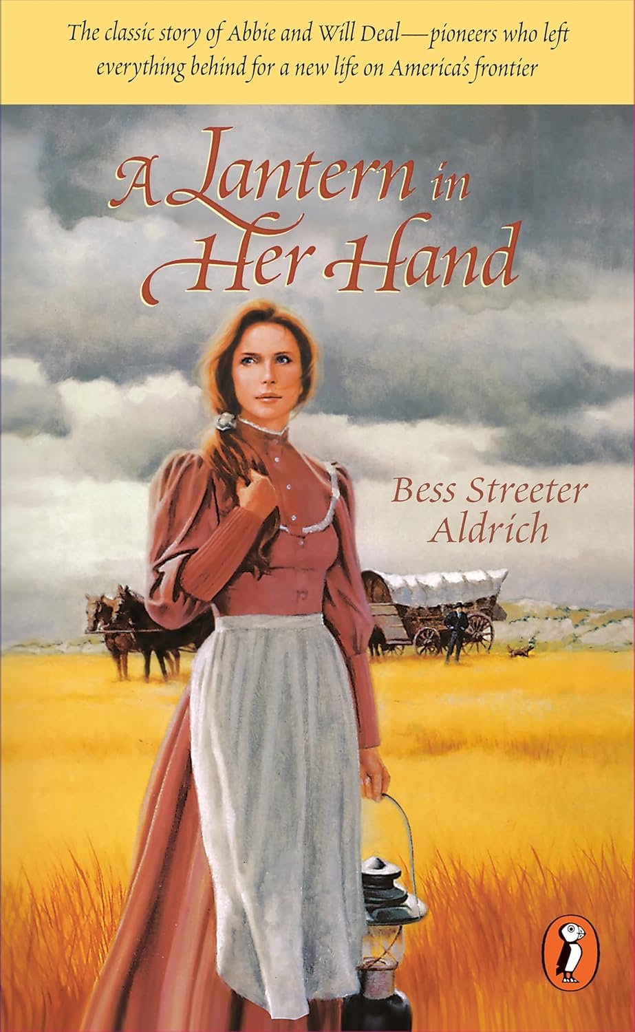 A Lantern In Her Hand classic novel book cover with rural Nebraska prairies in the background. 