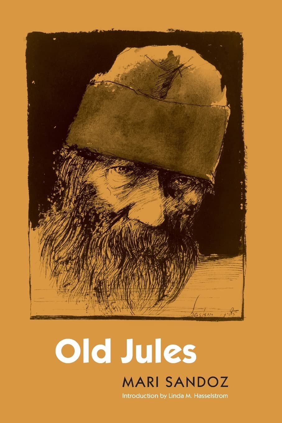 Old Jules classic novel about rural Nebraska book cover with Old Jules on front with beard and beanie, yellow cover with white writing.